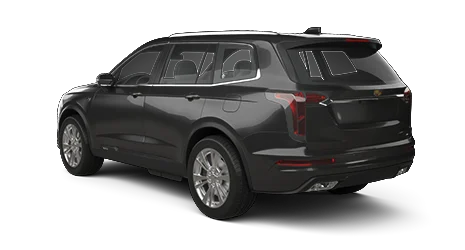 Black SUV car viewed from the rear and side, displaying modern design and alloy wheels.
